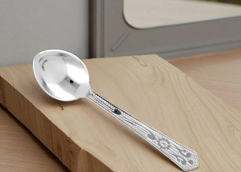 pure silver spoon